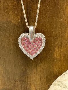 "Sterling Silver Double Heart Pendant Necklace.  Necklace and Pendant both marked 925.   Outer heart has Clear CZ border, inner heart is filled with pink CZ crystals.   Hangs at 1\"by 0.8\".   Sterling Silver Box Chain necklace is 30\" long.   Piece is in very nice condition.   Packaged for gifting." Pink Sterling Silver Double Heart Necklace, Pink Sterling Silver Heart Pendant Necklace, Multi-stone Heart Pendant Jewelry As Gift, Personalized Pink Heart-cut Necklace, Pink Heart-shaped Sterling Silver Necklace, Double Heart, Silver Box, Box Chain, Heart Pendant Necklace