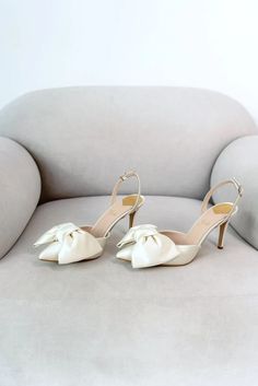 Ivory Bow Wedding Sandals With Slingback, Bridal Shoeswith Pointy High Heels and Closed Pointy Toe From Satin, Slingback Wedding Pumps - Etsy Ukraine White Evening Heels With Bow Straps, Elegant Cream Sandals With Pointed Toe, White Open Toe Heels With Bow Straps, Cream Slingback Pumps With Ankle Strap And Padded Heel, Cream Elegant Slingback Sandals, Elegant Cream Pointed Toe Sandals, Chic Low Heel Slingback Pumps For Wedding, Elegant Slingback Heels For Wedding Guest, White Open Heel Kitten Heels For Party