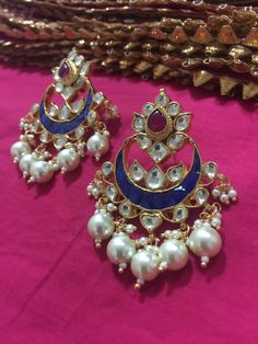 *It's Handmade Indian Ethnic Kundan Chandbali Designer Fashion Earrings with Pink and Blue Combination. *It's Multi Color Kundan Stones Settings and 22k gold Plating as shown in picture. *It is Real Kundan Design with Antique Touch and 2 inch long with hangings of pearls. *Our all jewelry is made from semiprecious stones and beads. *WARRANTY: ITS GENUINE HANDMADE JEWELRY AND WE ARE GIVING LONG LIFE WARRANTY FOR OUR ALL ITEMS. All of our Kundan Jewelry is 100% handmade with ancient Kundan stone s Partywear Earrings, Kundan Chandbali, Earrings Kundan, Indian Pink, Kundan Jewelry, Heritage Jewellery, Dangler Earrings, Multicolor Earrings, Chandbali Earrings