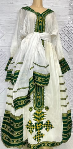 Traditional Ceremonial Dresses With Drape, Traditional Dresses With Ceremonial Traditional Drape, Ceremonial Traditional Drape Dresses, Traditional Dresses For Transitional Ceremonies, Traditional Kurta With Traditional Patterns, White Traditional Wear With Woven Motifs For Ceremonies, Traditional Kaftan With Woven Motifs For Festive Season, Ceremonial White Traditional Wear With Woven Motifs, Traditional Dresses For Ceremonies