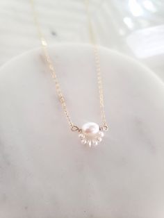 "These dainty and thoughtfully designed necklaces are stunning paired as a set or on their own! Would be wonderful for a bride or as a feminine and lovely touch to your every day. Genuine freshwater pearls are wire wrapped in a minimal/vintage-y/boho style. Made from top quality materials- true 14k gold fill or solid sterling silver, will not tarnish or turn you green, wear 24/7! Secured with an easy to use oval lobster clasp. Lead and nickel free. Excellent for sensitive skin! Come packaged in Elegant Pearl Layered Necklace With Delicate Chain, Elegant Pearl Layered Necklace As Gift, Elegant Pearl Layered Necklace Gift, Elegant Layered Pearl Necklace As Gift, Feminine Delicate Chain Necklace, Elegant Layered Necklace With Pearl Pendant For Gifting, Elegant Layered Necklace With Pearl Pendant As Gift, Elegant Layered Necklace With Pearl Charm For Gift, Elegant Gold Layered Necklace With Pearl Charm