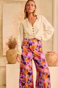 Casual and chic, our Palazzo pants are the ultimate statement pant to add to your wardrobe rotation. Designed in our much loved Ecovero Viscose Crepe which offers a soft hand-feel and drape, these pants are designed to sit high on the waist with a comfortable elasticated back waistband and dramatic wide-leg. The Palazzo is the ultimate pant to dress up with matching Jolie Blouse - Disco Dust for a statement set moment or with the Siren Top - Caramel. Julia wears size AU 8 and is 180cm. Sam (in s Siren Top, Statement Pants, The Siren, Palazzo Pant, Soft Hands, Palazzo Pants, Soft Hand, Spring And Fall, Jumpsuit Dress