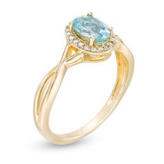 Marvel her with the details of this gorgeous gemstone and diamond ring. Crafted in warm 10K gold, this stunning style showcases a 7.0 x 5.0mm oval-shaped Swiss blue topaz wrapped in a shimmering diamond-lined halo. An open twist shank completes the look. Radiant with 1/15 ct. t.w. of diamonds and a brilliant buffed luster, this ring is certain to be treasured. Stunning Style, Diamond Frame, Peoples Jewellers, Blue Topaz Stone, Topaz Stone, Swiss Blue Topaz, Diamond Stone, 10k Gold, Blue Stone