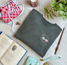 Bookish Embroidered Sweatshirt Luna Sweatshirt *dramione, marauders, regulus, bellatrix, luna, embroidered sweatshirt, embroidered crewneck, embroidered sweater, book lover gifts, magical shirt, bookish sweatshirt, booktok bookstagram,* ABOUT THIS SWEATSHIRT: This magical crewneck is the perfect solution for what to wear the next time you're feeling like you want to head to the room of requirement! It's cozy soft and has a unisex fit that can be styled any number of ways. Embroidered with special care, it's sure to last you a lifetime (unless you get stuck in the department of mysteries while wearing it). Every sweatshirt is hand made to order and usually takes between 5-7 business days to ship, so please plan in advance if you're looking for something to wear to a party or to give as a gi Marauders Regulus, Harry Potter Embroidery, Room Of Requirement, Book Lover Gifts, Quoi Porter, Embroidered Crewneck, Embroidered Sweater, Embroidered Sweatshirt, Embroidered Sweatshirts