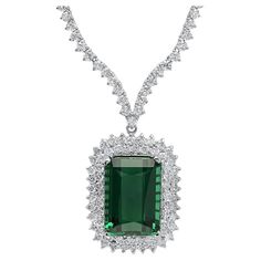 29.20Ct Natural Tourmaline and Diamond 18K Solid White Gold Necklace Natural Tourmaline Weights: Approx. 20.90 Carats Tourmaline Measures: Approx. 10 x 8 mm Total Natural Round Diamond weights: Approx. 8.30 Carats (color G-H / Clarity SI1-SI2) Total Chain Length is 18 inches Total item weight is: 25 grams Disclaimer: all weights, measurements and colors are approximate and may vary slightly from the listed dimensions or as seen in the image. All pictures are magnified to show the smallest of det Solid Necklace, White Gold Necklace, White Gold Necklaces, Emerald Jewelry, 14k White Gold Ring, Quality Diamonds, Yellow Gold Rings, White Gold Rings, Estate Jewelry