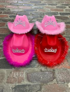 Looking for a fun gift for any party, girls night out, or bachelorette party? This Adorable cowgirl hat is any princesses dream. Perfect for birthdays, dressing up, or heading to the rodeo! We attached a sparkly feathered boa around the brim to add some sassy flair. The princess tiara is perfect for any girl! One size fits most ADULTS up to 22inches in size. The perfect one size hat for a party! *children sizes are also available in our shop !! Size: fits most adults from 12 years old to 105yrs. Fun Brimmed Costume Hats For Parties, Fun Costume Hats With Curved Brim For Parties, Fun Party Costume Hat With Curved Brim, Novelty Brimmed Costume Accessories For Party, Fun Party Mini Hat With Curved Brim, Novelty Party Hat Supplies, Fun Wide Brim Party Hat, Novelty Hats For Carnival Costume Party, Novelty Party Costume Hats And Headpieces