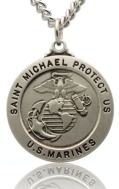 a necklace with the words, us marines and an eagle on it's side