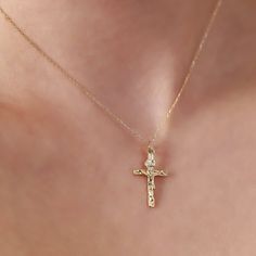 The intricately designed Cross Necklace, skillfully fashioned from 14K Gold, is an elegant and sophisticated accessory that adds a touch of refinement to any ensemble. Featuring a delicate cross pendant gracefully suspended from a fine gold chain, it is suitable for both everyday wear and special occasions. The use of 14k gold not only ensures durability but also imparts a lasting radiance. Here are the key details: Artisanally crafted from 14k solid gold All materials responsibly sourced from t Yellow Gold Plated Crucifix Jewelry, Gold Diamond Cut Crucifix Jewelry, Elegant Crucifix Jewelry With Diamond Cut, Diamond Cut Crucifix Jewelry For Formal Occasions, Elegant Diamond Cut Crucifix Jewelry, Elegant Crucifix Diamond Cut Jewelry, Elegant 14k Gold Crucifix Jewelry, Elegant Gold Crucifix Jewelry, Luxury 14k Gold Crucifix Jewelry