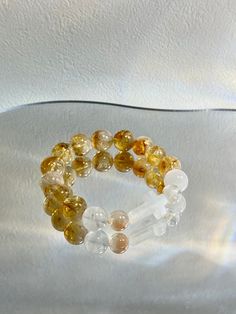 Citrine Crystal Bracelets Handmade and unique design from Merijane ©️ Function: Courage, Dynamic, Balanced Ingredients: Citrine, Clear Quartz, White Phantom Quartz Handmade Spiritual Citrine Bracelets, Handmade Clear Bracelets, Phantom Quartz, Citrine Crystal, Groomsman Gifts, Crystal Bracelets, Clear Quartz, Handmade Bracelets, Citrine