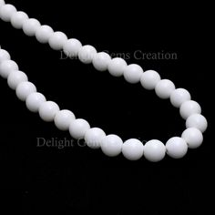 "Product Details : Item Code : DGC080 Gemstone Name : WHITE CORAL Chain Style : BEADED Beads Shape : SMOOTH ROUND Beads Size : 8 MM Approx Length : 18\" Inch Approx Weight : 255 Cts. Approx Customization : **Available** Please Feel Free To Contact If You Have Any Query." White Pearl Necklace With Gemstone Beads As A Gift, Classic White Jewelry With Polished Beads, White 108 Beads Jewelry As A Gift, White Faceted Beads Round Jewelry, Classic White Beaded Necklaces, Classic White Beaded Necklace, White Jewelry With Spacer And Round Beads, White Jewelry With Round Spacer Beads, Classic White Beaded Pearl Necklace