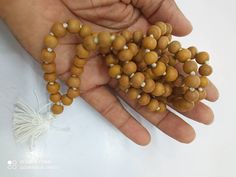 Pure Sandal wood Round bead chanting mala japa mala Prayer mala holy things spritual things. This mala can also be used as a neclace. Sandal is also good for health. Iskcon Mayapur made. Holistic Healing Mala With Wooden Beads, Holistic Wooden Beads Mala For Festivals, Brown Mala For Healing And Festivals, Spiritual Brown Mala For Healing, Holistic Wooden Beads Mala For Rituals, Holistic Wooden Mala For Rituals, Holistic Brown Mala With Wooden Beads, Spiritual Wooden Beads Mala For Puja, Spiritual Wooden Beads Mala For Meditation