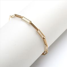 This stylish paperclip link chain bracelet is the best way to spice up any outfit! Wear alone for a classic look, or pair with other metal bracelets for a fun, stacked look! Bracelet Length: 7.5" Clasp Type: Lobster Clasp Material: Stainless Steel Please note: This is a final sale item and no returns or exchanges are accepted for this item. Product requires extended processing and shipping time. Bracelet In Silver, Cable Bracelets, Link Chain Bracelet, Trombone, Metal Bracelets, Wedding Bracelet, Paper Clip, Spice Up, Pure Silver