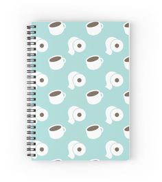 a spiral notebook with coffee cups and saucers all over it on a light blue background