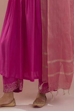 Pink Anarkali featuring hand embroidered sequin detailing on the neckline and sleeve hem. Paired with a matching pant and an organza dupatta., Fit: Relaxed Festival Slub Silk Churidar With Mirror Work, Festivals Slub Silk Churidar With Mirror Work, Fitted Slub Silk Salwar Kameez With Mirror Work, Fitted Slub Silk Dupatta With Mirror Work, Anarkali Slub Silk Palazzo Set For Party, Fitted Anarkali Set With Sheer Dupatta In Slub Silk, Fitted Slub Silk Anarkali Set With Sheer Dupatta, Traditional Drape Churidar With Mirror Work, Party Anarkali Set In Slub Silk With Cutdana