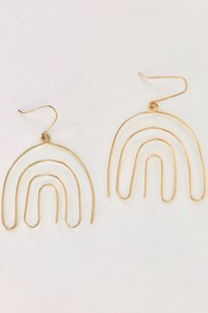 These Rainbow Earrings are handmade using 14k gold filled or sterling silver wire. These dangling earrings complete the look of any outfit. Shop these Rainbow Earrings at https://thirtynineonetwenty.com/product/rainbow-earrings-2/ #handmadeearrings #wirewrappedearrings #bohojewels #bohojewelry #jewelry #womensjewelry #goldfilledearrings #danglingearrings #womensearrings #rainbowearrings #statementearrings #bohoearrings #partyearrings #boho Hypoallergenic Gold Linear Earrings In Sterling Silver, Copper Wire Drop Earrings With Matching Set, Everyday 14k Gold Filled Nickel Free Threader Earrings, Gold Linear Earrings With Ear Wire In 14k Gold, Handmade 14k Gold Earrings For Everyday, Yellow Gold Dangle Linear Earrings With Ear Wire, Nickel-free Dangle Wrap Earrings, Nickel-free Drop Wrap Earrings For Everyday, Copper Wire Dangle Earrings