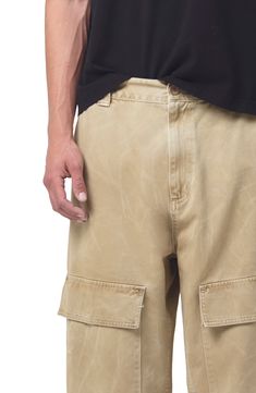 Roomy and relaxed, these cargo pants cut from soft cotton twill feature light fading and plenty of roomy pockets for holding a day's essentials. 29 1/2" inseam; 20" leg opening; 13 1/2" front rise; 16 1/2 back rise (size 29) Zip fly with button closure Front slant pockets; back flap-patch pockets; cargo flap-patch pockets 100% cotton Machine wash, tumble dry Made in the USA of imported fabric Relaxed Fit Utility Cargo Bottoms, Relaxed Fit Cargo Style Utility Bottoms, Utility Cargo Bottoms With Relaxed Fit, Beige Cotton Cargo Shorts With Belt Loops, Beige Cotton Cargo Pants With Multiple Pockets, Utility Cotton Bottoms With Cargo Pockets, Cotton Utility Bottoms With Cargo Pockets, Beige Cotton Cargo Jeans With Pockets, Relaxed Fit Utility Cargo Pants With Multiple Pockets