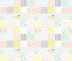 a colorful patchwork pattern with triangles and dots