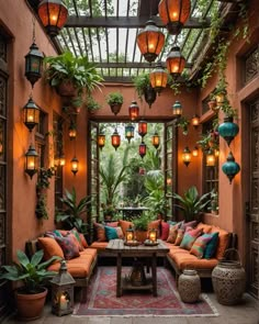 an outdoor room with lots of plants and lights