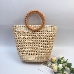 Bali Handmade Woven Rattan Bag Round Straw Shoulder Bag Women Summer New Hollow Out Retro Crossbody Bag Boho Beach Circle Bag Handmade handwoven ratta bean bags.This handcrafted bag is made with hand-harvested material and features a handle for carrying all your essentials. It's soft, lightweight, warm and has a detachable shoulder strap to keep it all together in one place! This bag also comes fully lined so you can carry all the necessities as you go about your shopping or travel. The bag carr Summer Bag With Bamboo Handle And Rectangular Shape, Summer Rectangular Bag With Bamboo Handle, Square Bags With Bamboo Handle For Vacation, Square Vacation Bags With Bamboo Handle, Beige Square Bags With Bamboo Handle, Summer Style Rectangular Shoulder Bag With Bamboo Handle, Travel Bags With Bamboo Handle For Beach Season, Brown Bags With Bamboo Handle For Beach Season, Vacation Satchel Bag With Bamboo Handle