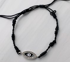 Fun colored evil eye bracelets that are drawstring made to fit all sizes. Evil Eye Charm, Evil Eye Bracelet, Diy Charms, Evil Eye, Art Sketchbook, Sketch Book, Beaded Necklace, Black, Color