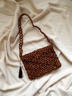 Wooden Beads Bag Brown Bag With Tassel Natural Shoulder Purse Boho Women Handbag Floral Motif Summer Bag wood beaded bag, vintage bag, boho bag, natural wood purse The tassel can be removed upon request. In this shop, I produce stylish and timeless bags with my imagination. My bags are the combination of natural materials and handcraft. I design useful and different models with love. I can improve myself with your ideas and suggestions and produce bags according to your wishes. Let's design toge Wooden Bead Bag, Beaded Brown Shoulder Bag For Vacation, Beaded Brown Tote Shoulder Bag, Beaded Rectangular Shoulder Bag In Natural Color, Brown Beaded Tote Shoulder Bag, Rectangular Beaded Shoulder Bag In Natural Color, Beaded Brown Shoulder Bag For The Beach, Beaded Natural Rectangular Shoulder Bag, Rectangular Beaded Clutch For Travel