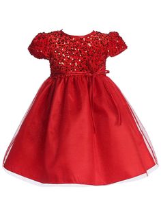 Your little girl will light up the room in this exquisite Lito velvet sequin adorned glitter tulle flower girl dress. Handcrafted in the U.S.A. with a stylish sequined bodice and glitter tulle skirt, this luxurious design is sure to make your special day extra memorable. This dress is available in a range of captivating colors, allowing you to choose the perfect shade to complement your event's theme. This dress is impeccably suited for the festive ambiance of the Christmas season. Girls Cape, Flower Girl Petals, Tiered Tulle Skirt, Tulle Flower Girl Dress, Kids Garments, Girls Holiday Dresses, Sequined Top, Princess Dress Up, Tulle Flower Girl