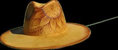 Indulge in artisanal cottagecore charm with our exquisite wide brim fedora hat adorned with hand-burned wildflowers using the unique ancient art of pyrography.   This hat is one-of-a-kind, meticulously crafted with freehanded artistry. Embrace individuality while exuding style.  Please note, for sanitation reasons, this product is non-refundable. Sunflower Burned Hat, Burned Hats, Chapeau Cowboy, Art Ancien, Wide Brim Fedora, Hat Band, Fedora Hat, Pyrography, Ball Cap