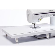 Whilst being a beautiful machine to use for all types of sewing, the Brother Innov-is 1800Q is a dream come true for the quilter or soft furnishing enthusiast. With its 234 built in stitches, including 99 utility stitches, 133 decorative stitches and 5 fonts, you can truly let your creative imagination run wild.
The Continuous Automatic Pressure System (ICAPS) automatically detects the thickness of your fabric and adjusts the foot pressure to suit as you sew, resulting in a superior even stitch quality with all fabric types. This feature is particularly useful when doing free motion sewing with the feed dogs down. It creates really neat precise stitches for all your projects, and if you press the lock stitch button whilst sewing a decorative stitch, the machine will automatically stop at t Plastic Rings Crafts, Free Motion Sewing, Quilting Hoops, Lock Stitch, Viking Sewing Machine, Needlecraft Kits, Decorative Stitches, Brother Sewing Machines, Childrens Sewing Patterns