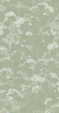 a green and white wallpaper with flowers on it