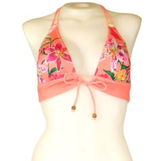 Double spaghetti ties at neck, keyhole front ties & hook back closure. Pink Strappy Tie-back Swimwear, Strappy Tie-back Swimwear For Spring, Spring Halter Neck Swimwear With Adjustable Straps, Fitted Tropical Halter Top, Spring Tie-back Halter Top For Sunbathing, Fitted Tropical Halter Neck Top, Spring Halter Top With Tie Back For Sunbathing, Spring Tie Back Halter Top For Sunbathing, Adjustable Straps Halter Top For Swimming In Spring