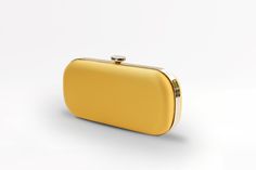 The Limoncello Yellow Bella Clutch is a bold yellow bridal handbag, crafted with duchess satin by Italian artisans featuring a lively pop of color. Planning a maximalist wedding day or looking to make a powerful statement at your next gala? Inspired by Italy’s Amalfi Coast, a coastline featuring terraced vineyards and cliffside lemon groves, this luxury handbag will make a statement on your wedding day, at a red-carpet affair, or on a tropical destination trip. First seen on celebrity stylist Mi Classic Yellow Evening Bag, Chic Yellow Clutch For Gift, Chic Yellow Rectangular Clutch, Chic Yellow Clutch As Gift, Chic Yellow Clutch As A Gift, Chic Yellow Clutch For Formal Occasions, Yellow Elegant Clutch For Formal Occasions, Elegant Yellow Clutch For Formal Occasions, Elegant Yellow Formal Clutch