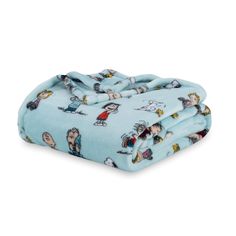 a blue blanket with cartoon characters on it