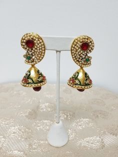 Stunning traditional indian earring will wow at your next festive occasion 22k yellow gold plated, hypoallergenic nickle and lead free Cubic zirconia, Pearl  Red Onyx, and Green Onyx Gemstone Pushback closure Jhumka Style earring Earring Indian, Jewelry Boutique, Indian Earrings, Onyx Gemstone, Jhumka Earrings, Green Onyx, Traditional Indian, Boutique Jewelry, Indian Jewelry