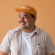 Treat your rad dad to the ultimate accessory - our burnt orange flat brim hat! With high quality ivory embroidery and a stylish design, it's perfect for on-the-go errands and everyday dad life. Don't miss out on this cool, must-have hat for the coolest dad around. Casual Brown Flat Cap Trucker Hat, Orange Casual Snapback Hat With Flat Bill, Casual Orange Snapback Hat With Flat Bill, Casual Orange Baseball Cap With Flat Bill, Orange Flat Bill Baseball Cap, Casual Brown Baseball Cap, Casual Orange Flat Bill Baseball Cap, Casual Brown Fitted Hat, Casual Orange Snapback Hat With Curved Brim