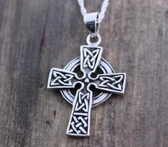 "Please use this link to add the engraving service: https://etsy.me/30lndjH This sterling silver pendant is just Amazing!! this Celtic Cross necklace is not just beautiful in design but also in meanings, this pendant is a symbol that emphasizes the endlessness of love of God. The Celtic sign on the arms represents friendship, affection, that cannot be broken. NOTE: If you need the cross engraved, please use this link to add the engraving service: https://etsy.me/30lndjH The trinity design symbol Symbolic Sterling Silver Cross Necklace, Silver Cross Pendant Necklace With Sterling Silver Clasp, Symbolic Silver Cross Necklace, Sterling Silver Necklace With Cross Pendant Stamped 925, Symbolic White Gold Cross Necklace, Symbolic Engraved Sterling Silver Necklaces, Sterling Silver Necklace With Oxidized Cross Pendant, Sterling Silver Cross Necklace Hallmarked, Sterling Silver Cross Necklace, Hallmarked