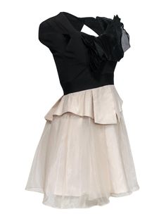 Bring a retro vibe to your next formal event with this dress from Karen Millen! This two-toned piece features ruffles and tulle that give this dress an '80s-inspired twist. Pair with pumps and statement earrings for a throwback look. Size 4 Shell: 88% Polyester, 12% Elastane Lining: 100% Polyester Exposed back zipper w/ large buttoned keyhole cutout Lined Fit and flare silhouette Sweetheart neckline Cap sleeves Ruffled design on bust Two tiered skirt w/ tulle overlay Bust 30" Waist 25" Sleeve le Elegant Party Mini Dress With Layered Hem, Fitted Evening Dresses With Overlay, Elegant Mini Dress With Ruffled Skirt For Prom, Elegant Fitted Dress With Overlay, Elegant Fitted Dress With Layered Hem, Fitted Ruffle Dress For Prom With Ruffled Skirt, Fit And Flare Ruffled Dress For Night Out, Summer Formal Evening Dress With Ruffles, Fitted Ruffle Evening Dress For Summer