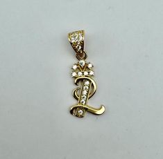 Gorgeous 14k Solid Yellow Gold "Letter G" Pendant with Zirconia - 14k Solid Yellow Gold - ML28   / 4 Condition: Excellent New Pendant. Shows minimal signs of wear as pictured (these are very close-up photos). Metal Content: Guaranteed 14k solid Gold as Stamped Pendant's Length: 15 mm Pendant's Width: 10 mm Pendant's Thickness: 1 mm Total Weight: 1 gr Actual item pictured. All of our pictures are authentic to show you every angle of the item. Thank you for shopping at our vintage store. Most of t Gold Letter, Letter L, Letter G, Gold Letters, Close Up Photos, Vintage Store, Vintage Shop, Solid Yellow, Last Minute Gifts