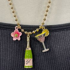 This Is A Cool Necklace That Is New With The Tags. Trendy Charms Necklaces For Party, Trendy Party Necklaces With Charms, Trendy Party Charm Necklace With Chain, Trendy Party Charm Necklaces With Chain, Trendy Party Charm Necklace, Trendy Party Charm Necklaces, Trendy Charm Necklaces For Party, Party Charm Necklaces, Chic Pink Necklace For Spring