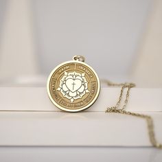 Embrace your faith with this beautiful handmade Lutheran Rose Necklace. This gold pendant features the iconic Lutheran Rose symbol intricately engraved on it. Ideal for those who want to express their Christian faith through their jewelry, this pendant makes a meaningful and stylish accessory. Features: Material: 14K Solid Gold - 10K Solid Gold - 925K Silver - 925K Gold Filled  Design: Detailed engraving of the Lutheran Rose symbol Packaging: Comes in a beautiful gift box, ready for gifting Spir Gold Spiritual Jewelry And Charms For Blessing, Spiritual Engraved Yellow Gold Medallion Necklace, Engraved Yellow Gold Spiritual Medallion Necklace, Spiritual Yellow Gold Medallion Necklace As Gift, Gold Engraved Jewelry For Blessing, Gold Spiritual Engraved Medallion Necklace, Gold Spiritual Jewelry Laser Engraved, Personalized Gold Spiritual Jewelry And Charms, Spiritual Gold Jewelry Laser Engraved