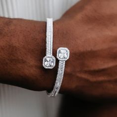 Introducing the Pave Cushion Cut Baguette Cuff- our latest GLD exclusive to ice out your wrist! This 14k White Gold piece is decked out in hand-set stones on a baguette band, featuring pave cushion cut stone accents on each end. Meticulously crafted, this cuff is made with a spring hinge for easy on and off while staying on securely. Pair it with our Iced Cushion Cut Tennis Chain for a set that is sure to shine! This product is guaranteed for life – GLD will repair or replace the item should you Baguette Band, Tennis Chain, Gold Piece, Vermeil Jewelry, Custom Earrings, Gold Plated Bracelets, Spring Hinge, Drop Necklace, Pendant Bracelet