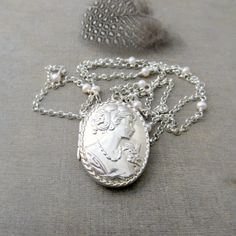 Large Locket Silver Cameo Locket Pearl Locket by LexiandGem Elegant Silver Jewelry With Vintage Charm, Silver Vintage Charm Oval Pendant Jewelry, Elegant Antique Silver Jewelry With Vintage Charm, Silver Oval Pendant With Vintage Charm, Silver Oval Vintage Style Necklace, Victorian Sterling Silver Locket Necklace, Silver Oval Locket Necklace For Vintage Collection, Oval Silver Locket Necklace For Vintage Collection, Victorian Silver Locket Necklace For Anniversary