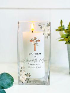 |Personalized Baptism Candle, Baptism Favor, Christening Gift, First Communion Gift, Christening Custom Candle, Godson Gift, Goddaughter, | Our Handmade Personalized Baptism Candle is the perfect addition to any baptism, christening, or first communion ceremony. This candle is not only a beautiful decoration piece, but also a meaningful keepsake that will be cherished for years to come. Each candle holder is made with the highest-quality glass and paired with a 3x6-inch pillar candle. The glass holder features a beautiful quote and measures 4 inches in width and 8 inches in height. You can personalize the candle with a name and date, making it a truly unique and special gift. { ABOUT OUR CANDLE HOLDERS } ⦁Keepsake Design: Unlike printed candles that melt the design when lit, these centerpi Baptism Centerpieces Ideas, First Communion Centerpieces, Baptism Baby Boy, Communion Decor, Baptism Candle Favors, Communion Centerpieces, Baptism Centerpieces, First Communion Ideas, Godson Gifts