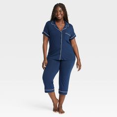 Add cool and comfy style to your everyday sleepwear collection with these Cloud-Knit Short-Sleeve Notch Collar Top and Cropped Pants Pajama Set from Auden™. Made from soft, stretchy fabric for a comfortable fit, this set includes a short-sleeve notch collar button-down top and cropped pants for a complete look. Plus, drawcord elastic waistband on the pants offers an adjustable fit. Wear the pieces as a set or mix and match with other PJs to put together a variety of sleepwear outfits. Auden™: Co Relaxed Fit Blue Sleepwear For Relaxation, Comfy Blue Sleepwear For Lounging, Blue Sleepwear Long Pants For Loungewear, Blue Relaxed Fit Sleepwear For Loungewear, Blue Long Pants Sleepwear For Loungewear, Comfortable Blue Sleepwear With Relaxed Fit, Cozy Blue Sleepwear For Loungewear, Blue Relaxed Fit Sleepwear For Lounging, Casual Blue Sleepwear For Pajama Party