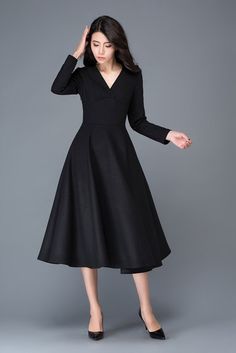 It is a wool blend dress, it has a polyester lining V collar Side hidden zipper Has no pockets   Shop sizing chart FYI ( made according to US sizing. actual body figures, NOT laying flat clothes measurements)  SIZE (US 0, UK 4, Italian 34, French 32, German 30, Japan 1) bust: fits bust around 32.5” / 82.5cm Waist: fits waist around 25” / 64cm Hips: fits hips around 35” / 89cm For overall height: 52 / 157cm around  SIZE (US 2, UK 6, Italian 36, French 34, German 32,) bust: ... Elegant Formal V-neck Dress In Solid Color, Winter Evening Maxi Dress With V-neck, Winter V-neck Solid Color Midi Dress, Classic Long Sleeve Midi Evening Dress, V-neck Solid Color Midi Dress For Winter, Classic Black A-line Maxi Dress, Elegant Solid Color V-neck Dress For Formal Occasions, Elegant V-neck Formal Dress In Solid Color, Elegant A-line Winter Maxi Dress