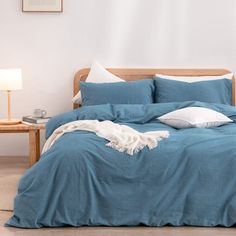 PRICES MAY VARY. Material: 100% washed cotton, slightly wrinkled look, great linen feel. If you want a linen style bedding, this duvet cover set is beautiful and perfect! The fabric is so soft yet with a very light crispness to it, even after washing, and it will get softer with each wash. It's like sleeping in a cloud. Simple classic solid dark blue, working with any bedding. Duvet cover reverses to same. Pillowcase ends with envelop closure. Twin/Twin XL Size Duvet Cover Set (2 pcs) includes: Textured Duvet Cover, Twin Size Duvet Covers, Style Bedding, Queen Size Duvet Covers, Natural Bedding, Lightweight Bedding, King Size Duvet Covers, Comfortable Chic, King Size Duvet