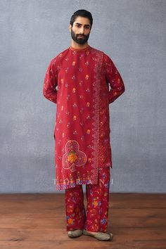 Red full sleeve overlap kurta with floral, heart, clover print and band collared neckline. Paired with printed pant. - Aza Fashions Red Long Sleeve Salwar Kameez For Traditional Ceremonies, Red Long Sleeve Kurta For Traditional Ceremonies, Red Cotton Kurta For Traditional Ceremonies, Red Traditional Wear With Printed Motifs For Transitional Season, Red Long Sleeve Traditional Wear With Traditional Patterns, Red Traditional Long Sleeve Wear, Red Long Sleeve Traditional Wear, Red Unstitched Long Sleeve Kurta, Red Sherwani With Chikankari Embroidery Long Sleeve