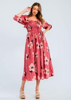 Easy floral midi dress featured in a flowy silhouette with a smocked bodice and volume sleeves. Cotton voile, textured fabrication  Relaxed fit  Side pockets -Contents 70%Cotton 30%Rayon Approximate measurements are as follows Small: Length:48 3/4 " Bust: 29"- 49"  Waist: 28- 48" Medium: Length:49 1/4" Bust:31"-51"    Waist 30- 50"  Large: Length:49 3/4" Bust:33"-53" Waist 32 -52" Flowy Floral Print Dress For Casual Occasions, Feminine Floral Print Midi Dress For Casual Wear, Feminine Floral Print Midi Dress For Day Out, Chic Maxi Floral Dress With Ditsy Print, Chic Ditsy Floral Print Maxi Dress, Square Neck Floral Dress For Day Out, Ruched Knee-length Midi Sundress, Floral Print Chiffon Midi Dress For Garden Party, Flowy Ditsy Floral Print Dress For Casual Wear