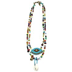 Necklace with crochet evil eye, shell, glass beads and metal decorative elements The jewelry that you will receive may have slight variations or imperfections due to the nature of handmade. Handmade jewelry can be extra delicate, so a little extra care will allow it to last a lifetime Please note that actual colors may vary due to different displays. Makes the jewelry a great gift: every jewel is delivered with a gift packaging To view more items from this shop, click the link below:  www.etsy.c Bohemian Cowrie Shell Beaded Necklace For Festival, Handmade Spiritual Beaded Necklaces For Summer, Spiritual Multi-strand Beaded Necklaces For Beach, Spiritual Jewelry For Vacation, Bohemian Shell Beaded Necklaces For Festivals, Bohemian Festival Shell Beaded Necklaces, Bohemian Shell Beaded Necklace For Festivals, Bohemian Festival Shell Beaded Necklace, Handmade Spiritual Necklace For Summer