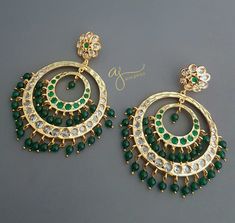 Traditional Hyderabadi chandbali earrings, studded with clear polki stones. Emerald green bead drops have been added to finish the look . Gold plated. Stunning design. Big size. Please see additional photos for earrings size. Green Hand Set Chandbalis For Diwali, Green Chandbali Bridal Earrings With Latkans, Green Kundan Chandbalis With Gota Work, Green Chandbali Danglers For Wedding, Green Hand Set Chandbalis For Festivals, Green Chandbalis With Stone Work For Festivals, Green Bollywood Chandbalis For Celebration, Green Chandbali Chandelier Earrings For Diwali, Green Hand Set Round Chandbalis