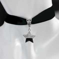 Make a statement with this beautiful handmade choker necklace featuring a half black, half rhinestone star pendant. Perfect for those who love all things Gothic and space-themed. Adjustable velvet strap with a lobster closure for easy wear. Ideal for special occasions like weddings, graduations, and anniversaries. #chokernecklace #gothicstyle #spacethemed #starnecklace #handmadejewelry #statementpiece 🌟🖤✨ #chokerjewelry #chokernecklace #jewelryshop #jewelrylovers #jewelrystore #cutechokers Handmade Choker Necklace, Pendant Choker Necklace, Diamond City, Necklace Gothic, Pendant Choker, Jewelry Choker, Kundan Jewellery, Velvet Material, Star Pendant